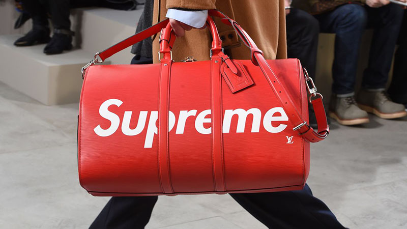 supreme luggage fake