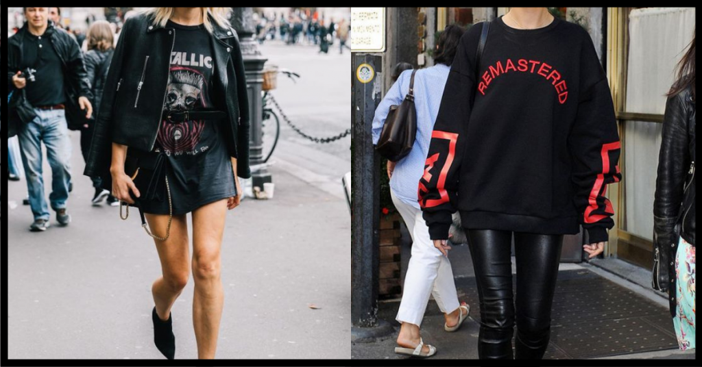 Two women wearing printed black clothes.