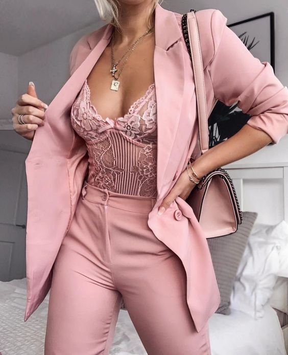 women wearing an all pink night out outfit with bodysuit