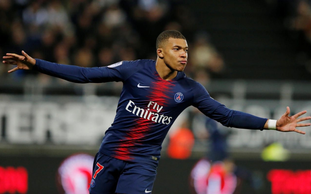 Kylian Mbappé playing for PSG as #7