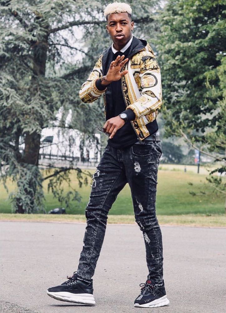 Presnel Kimpembe wearing a street style outfit