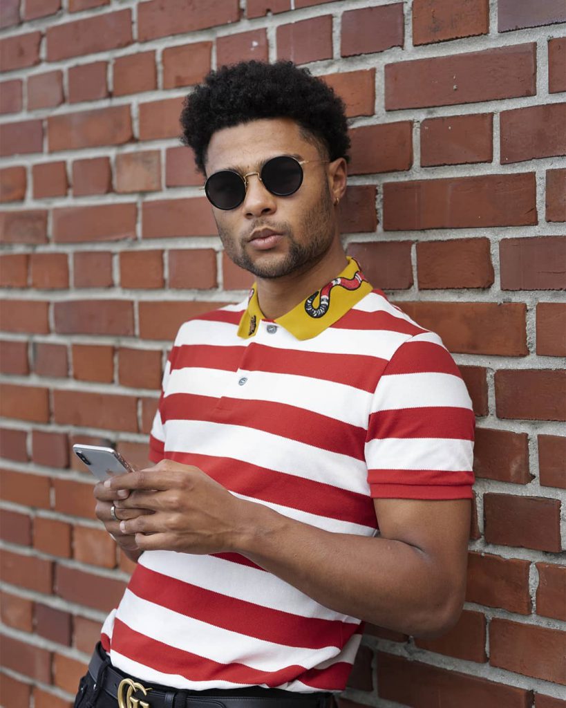 Serge Gnabry wearing a street style outfit