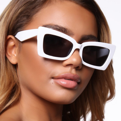 Woman wearing white sunglasses