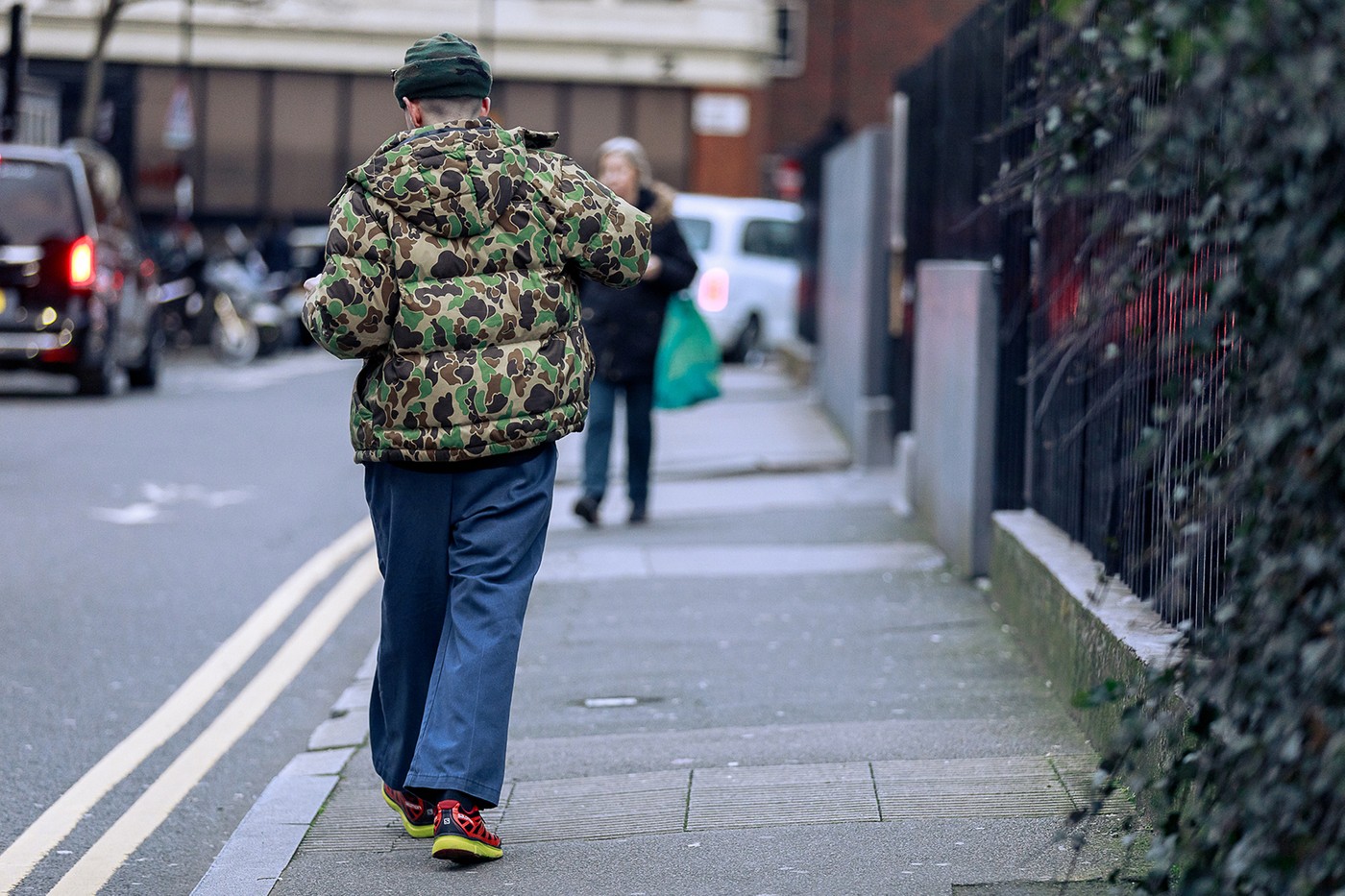 street-style-london-fashion-week-aw20-men-walking-with-camo-puffer-jacket